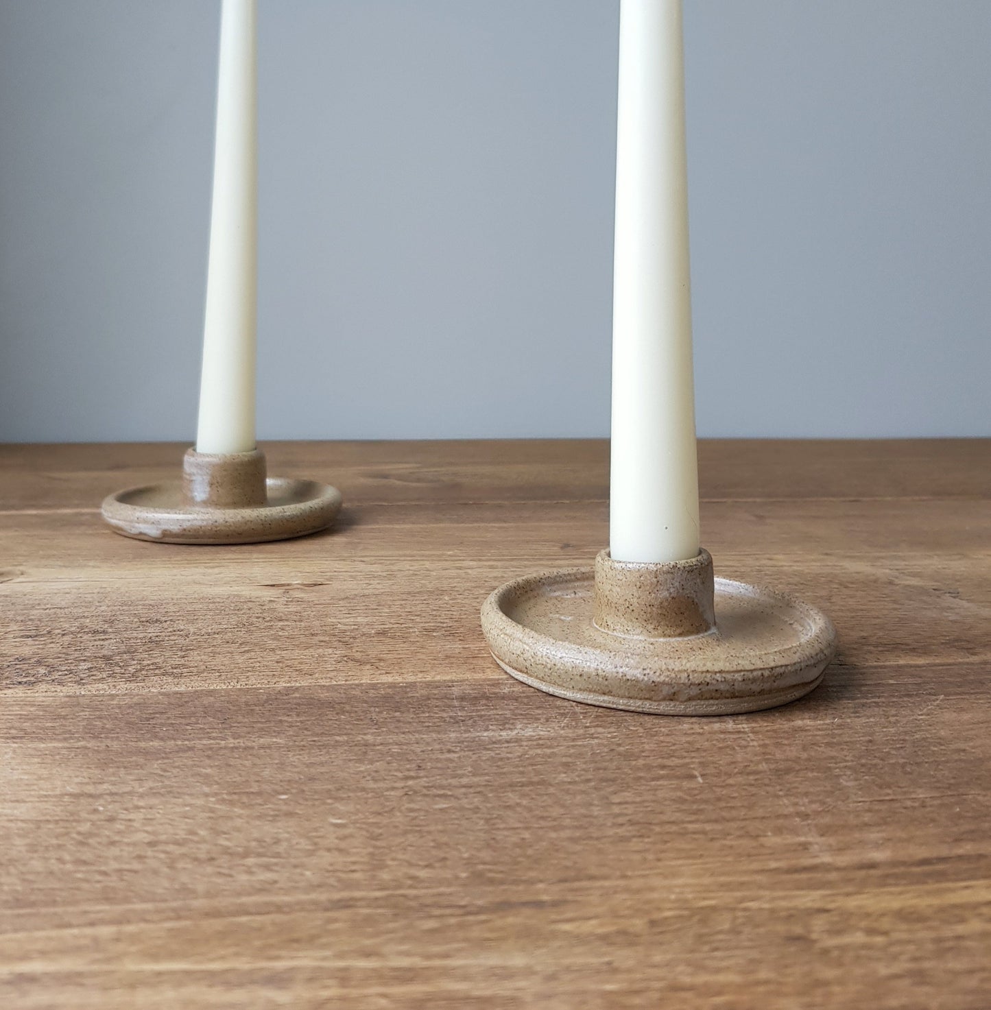 Brown speckled candlestick holder