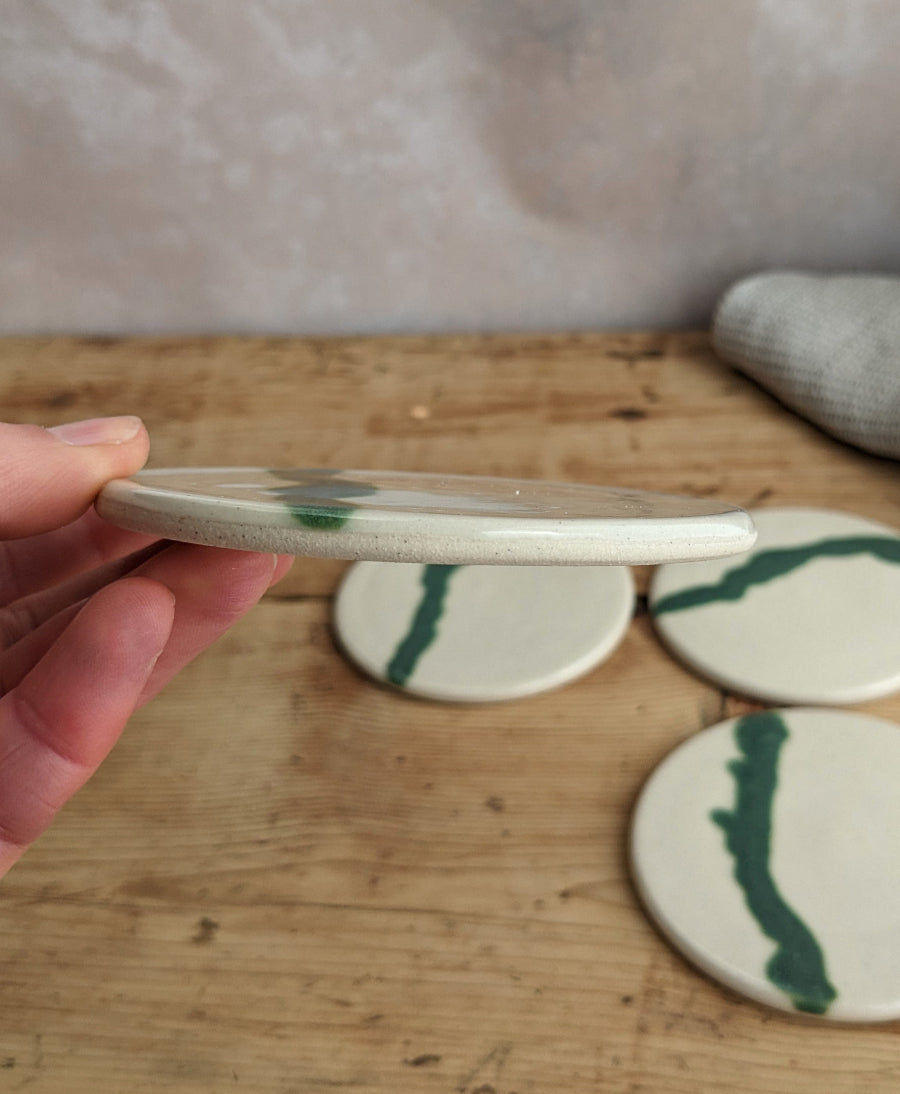 White and turquoise coaster set