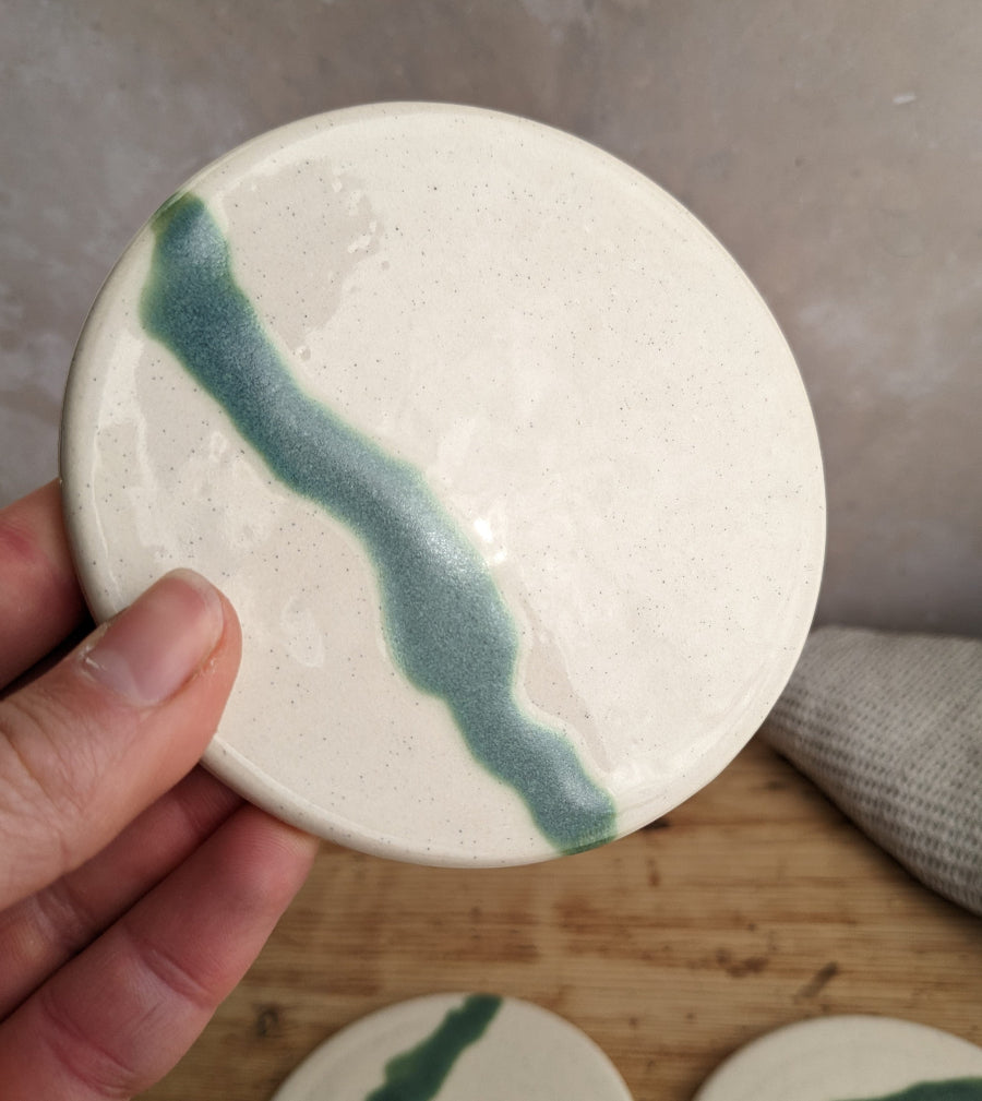 White and turquoise coaster set